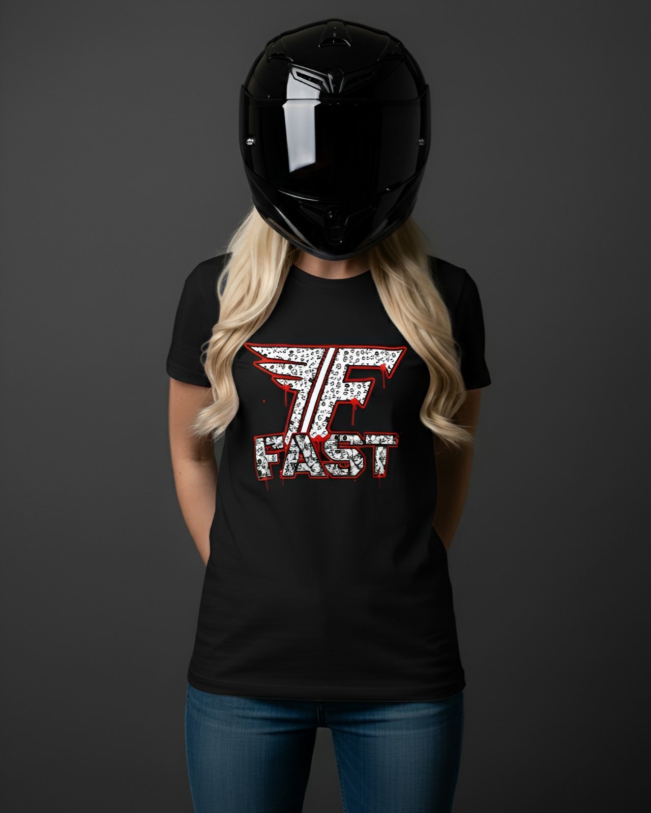 A blonde woman in a black helmet and black superbike t-shirt, part of motorcycle enthusiast apparel, featuring an art shirt design.