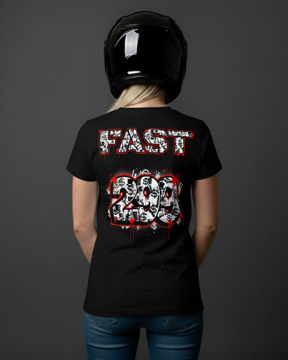Back of a blonde woman wearing a black "FAST 299" superbike t-shirt with dollar signs and red accents, ideal for motorcycle enthusiast apparel.