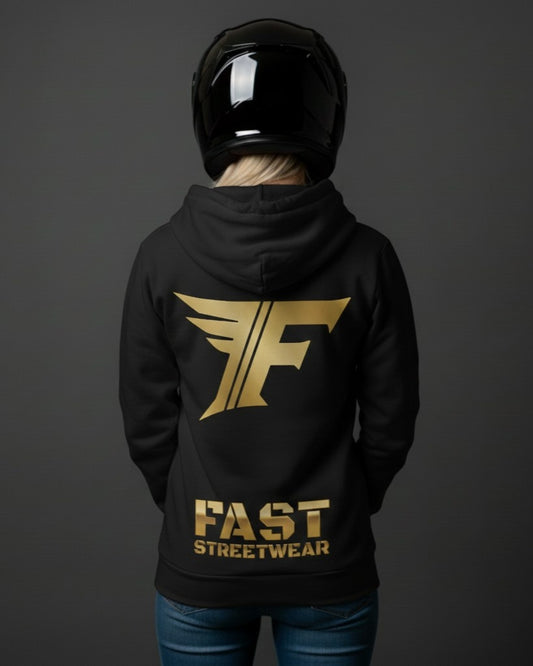 Back view of a person wearing a black hoodie with a large, gold "F" wing logo and "FAST STREETWEAR" printed below, set against a dark background.
