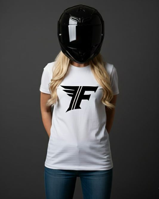 Person wearing a black t-shirt with a white logo and a black helmet on a dark background