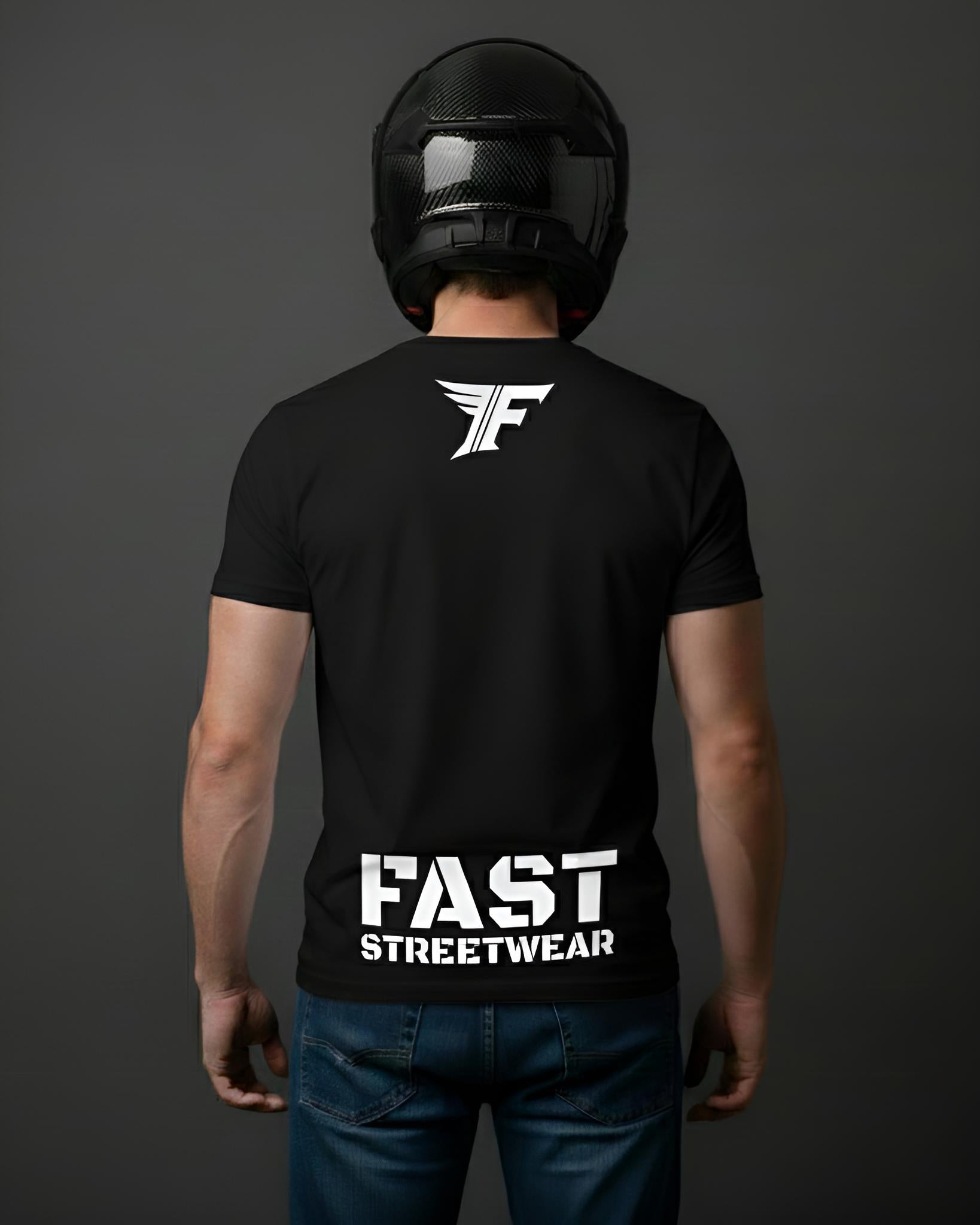 Person wearing a black t-shirt with 'FAST STREETWEAR' text and logo on the back, against a dark background.