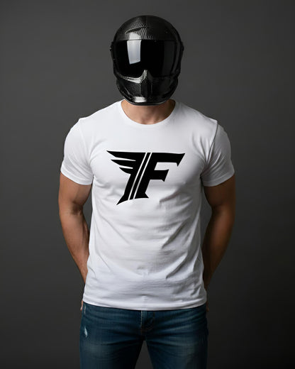 Person wearing a white t-shirt with a black logo and a black helmet on a dark background