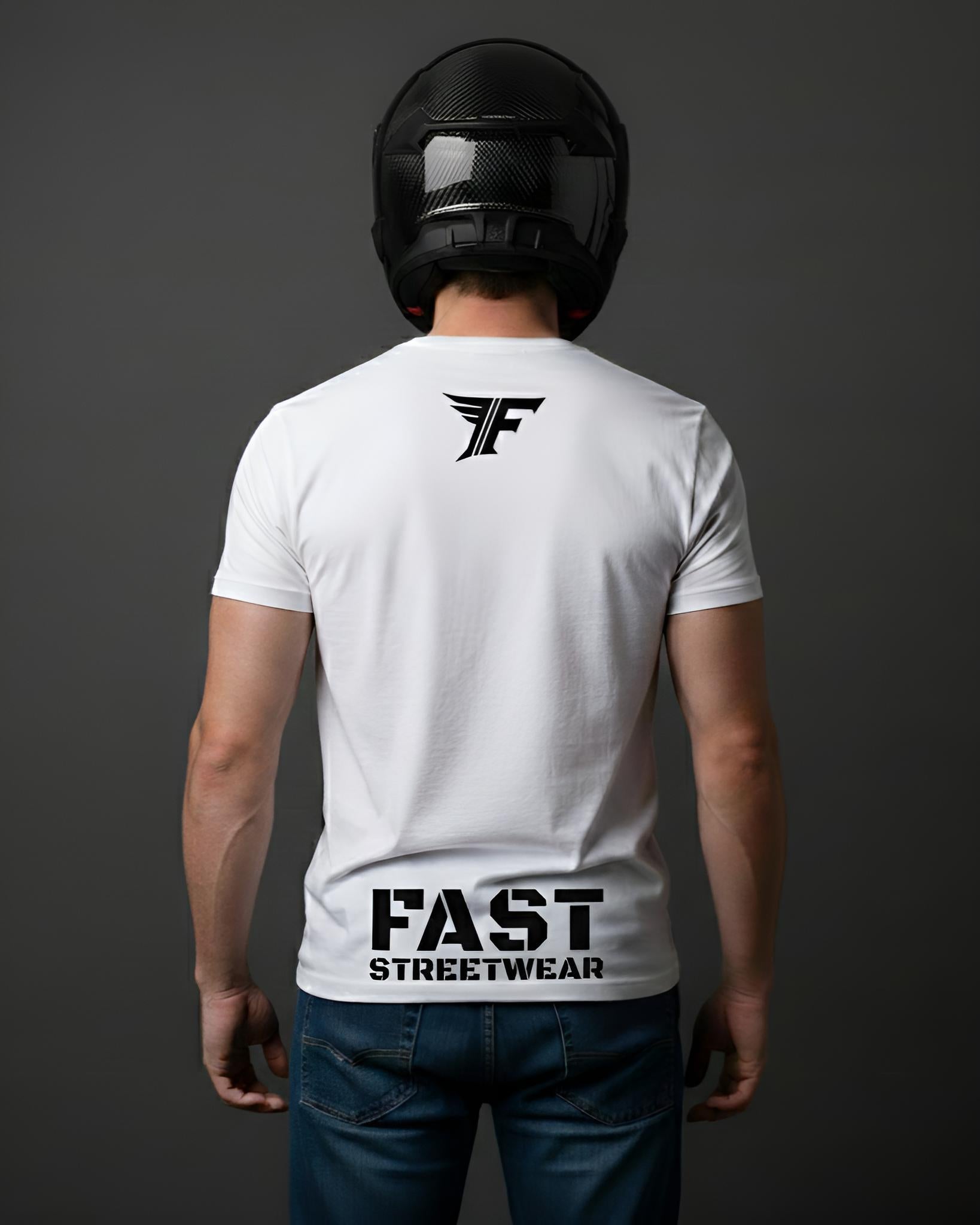 Person wearing a white t-shirt with 'FAST STREETWEAR' text and logo on the back, standing against a dark background.