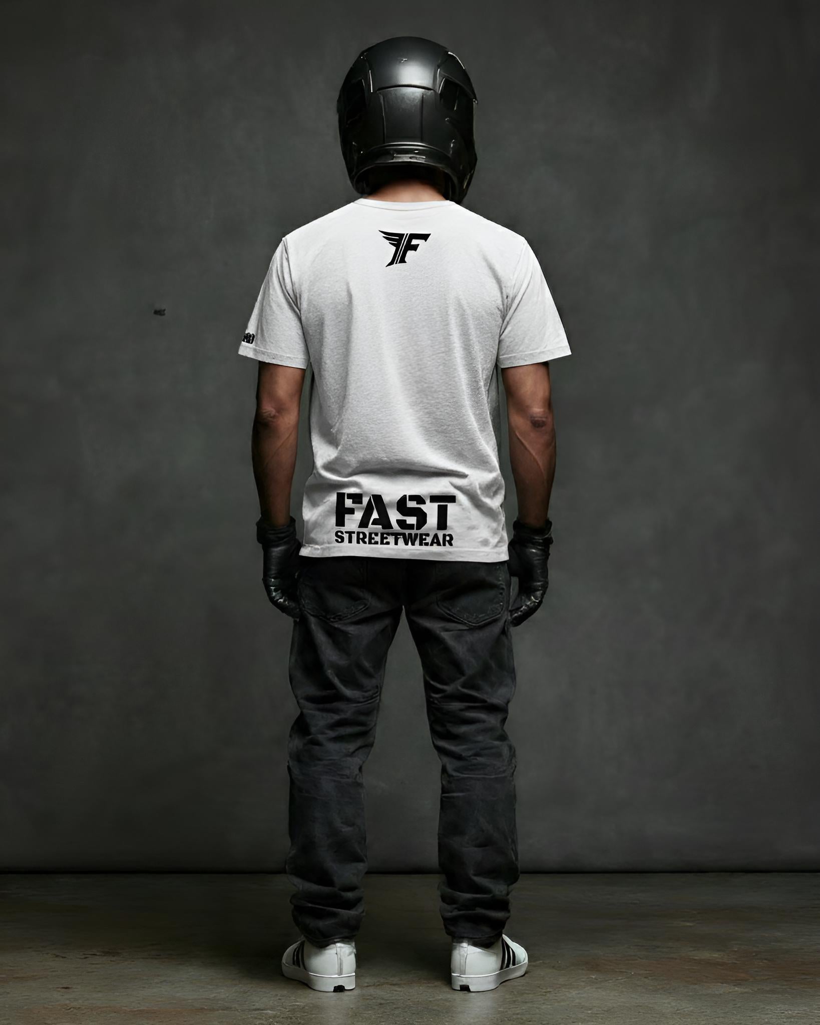Person wearing a white t-shirt with 'FAST STREETWEAR' branding, black helmet, and dark pants against a gray background.