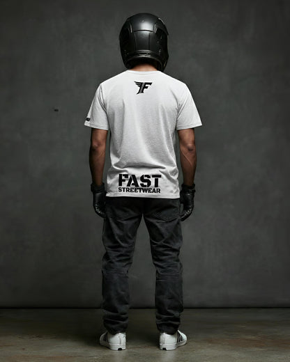 Person wearing a white t-shirt with 'FAST STREETWEAR' branding, black helmet, and dark pants against a gray background.
