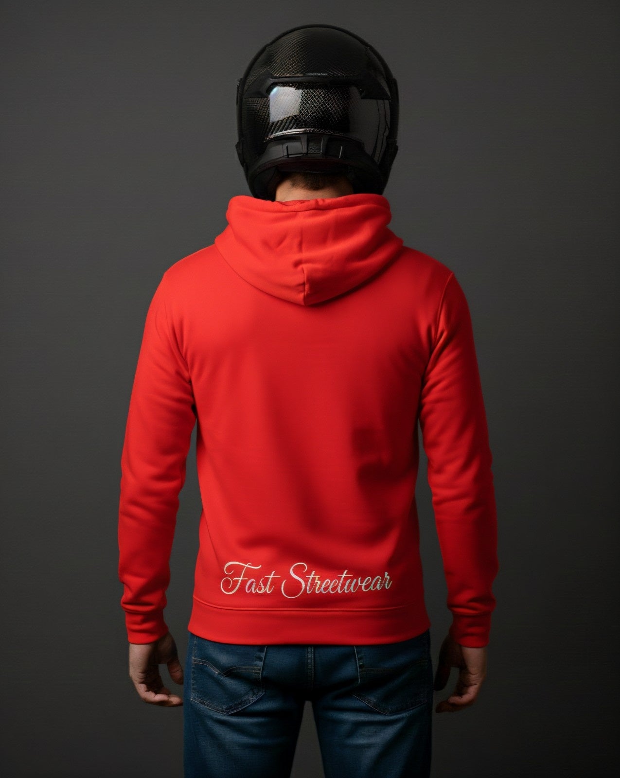 Person wearing a red hoodie with 'Fast Streetwear' text, standing against a dark background