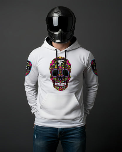 White hoodie featuring a large, brightly colored Day of the Dead sugar skull design on the chest, worn by a person in a carbon fiber motorcycle helmet.
