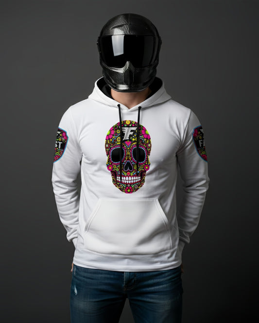 White hoodie featuring a large, brightly colored Day of the Dead sugar skull design on the chest, worn by a person in a carbon fiber motorcycle helmet.