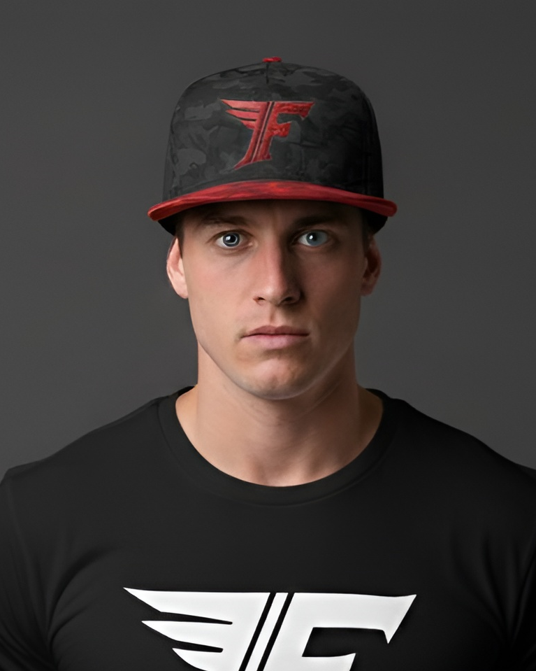 Man wearing a black cap with a red logo and a black t-shirt with a white logo on a gray background